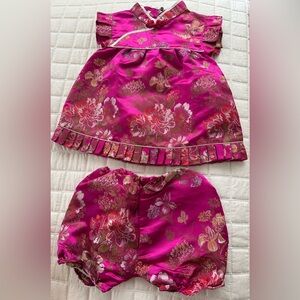 Vibrant Pink and Gold Baby Dress with Floral Design